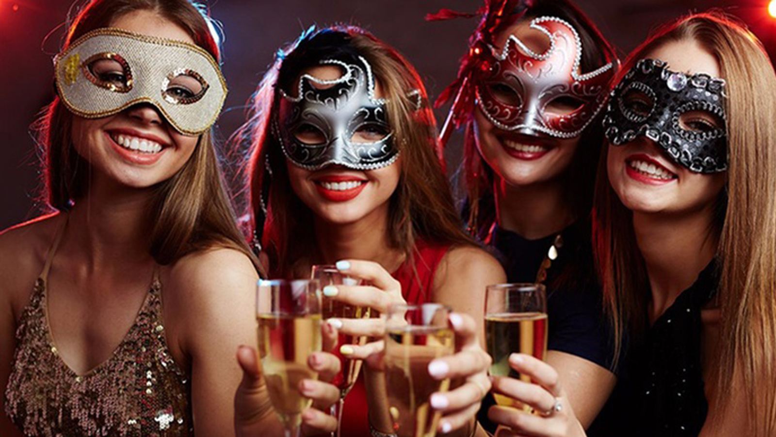 girls wearing masks at a themed event