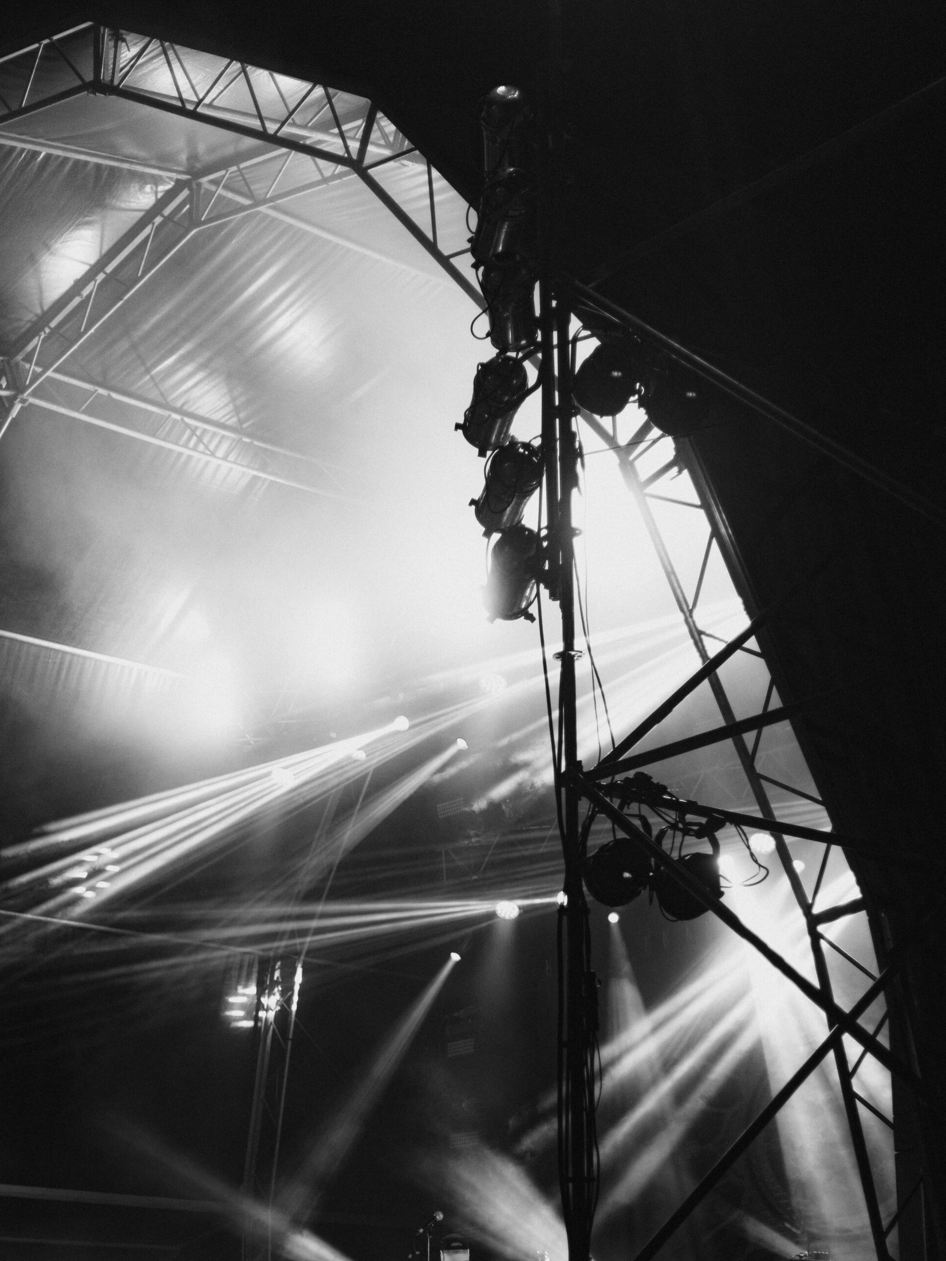 black and white image of large scale lighting and stage rig